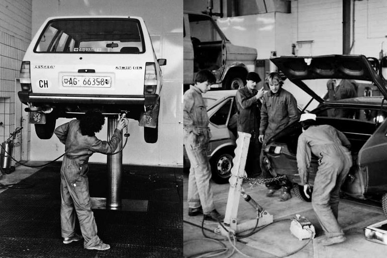 Historische Schwarzweissfotos der Simon AG: Mitarbeitende reparieren Autos.